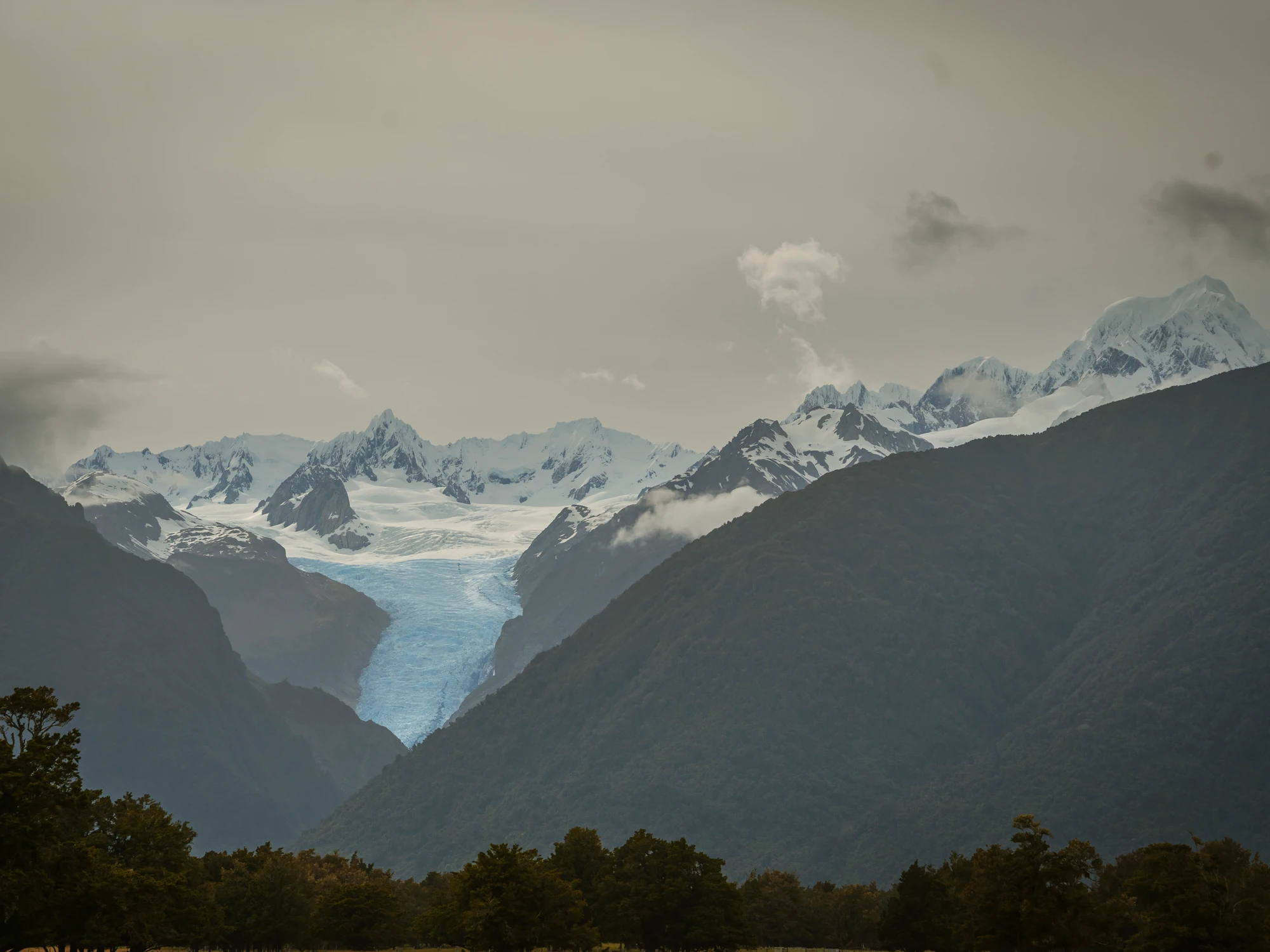 Mountain valley clouds near Fox Glacier