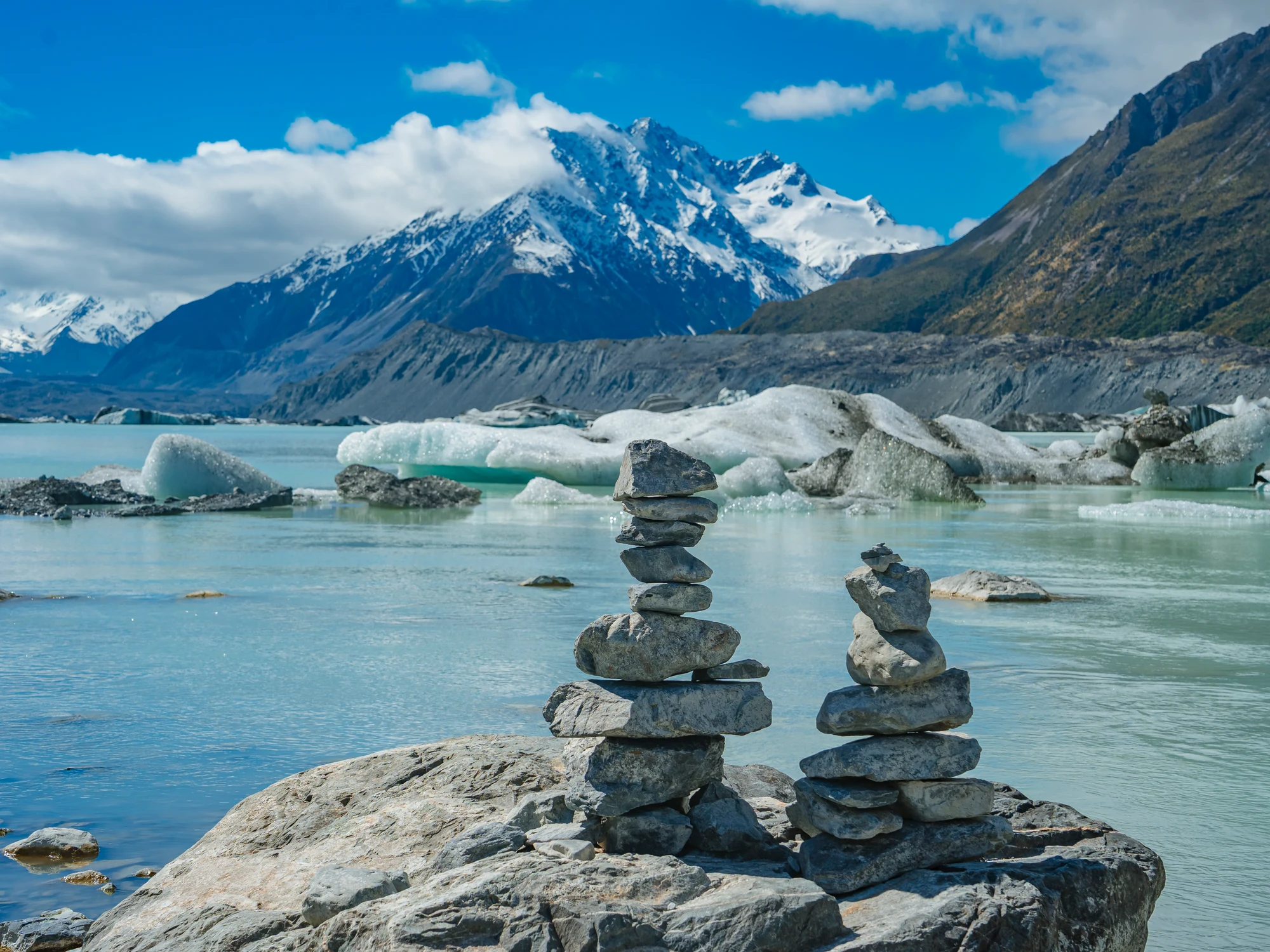Glacial lake and cairns on an Aoraki / Mt Cook track