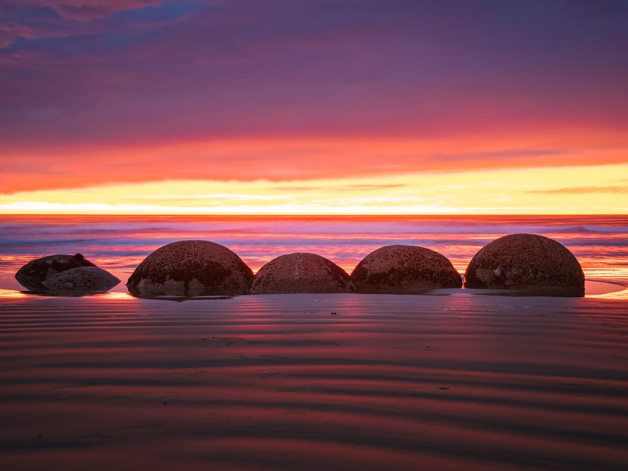 Moeraki Boulders along the coast at dawn
